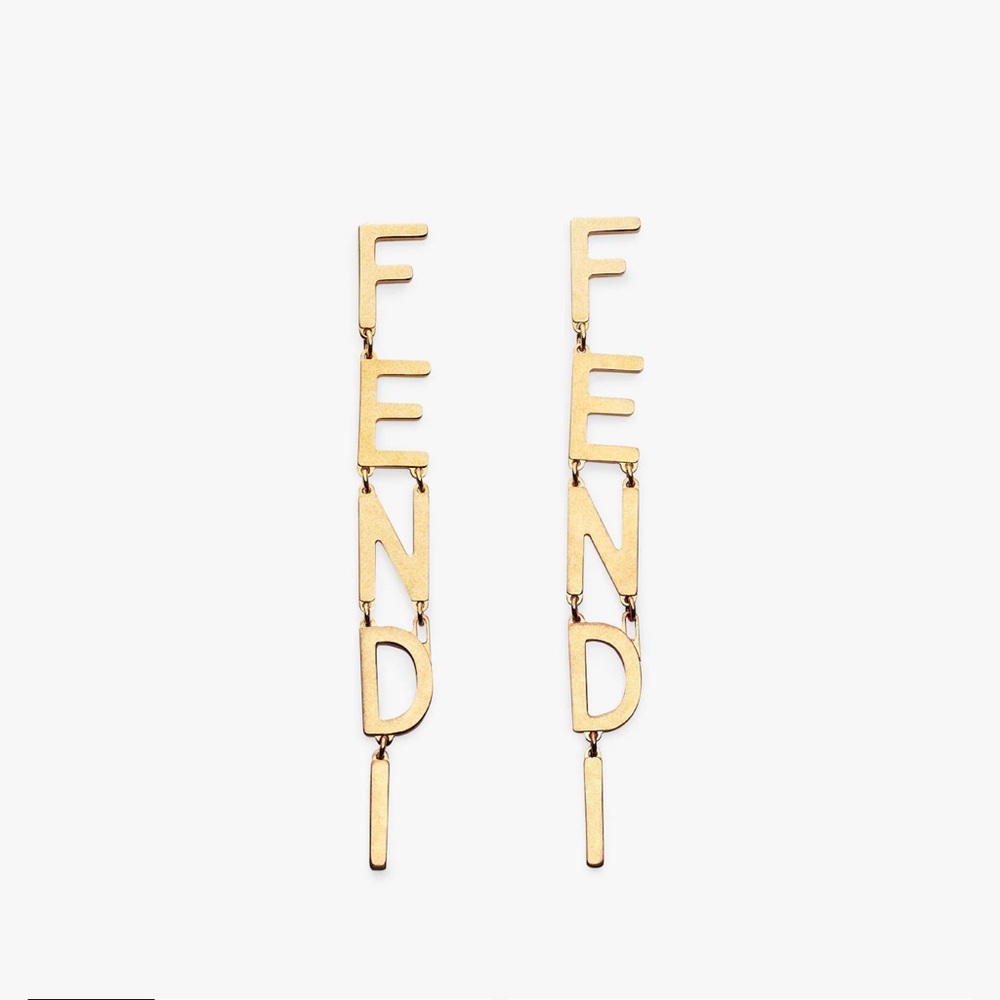 Signature Earrings
Vintage gold-color earrings